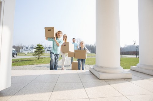 Packing boxes and furniture for a Forestdale home relocation