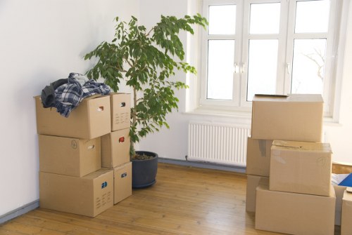 Packed boxes and furniture prepared for a small removal service