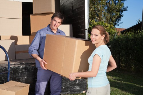 Family preparing for house removals in Forestdale with organised packing